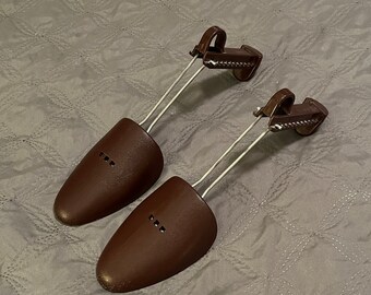 Vintage Plastic and Metal Shoe Stretchers -- Two adjustable shoe trees, 1 smaller, 1 larger, length ranges from 10 to 13 inches