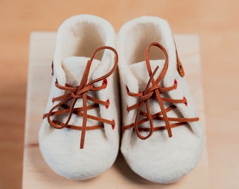 Personalized Hand-Made Wool Felt Booties for Newborn Babies, presented in a high-quality pine wood keepsake box.