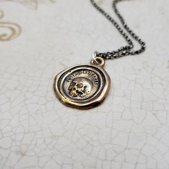 Memento mori best sale pendant