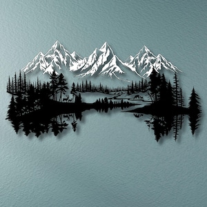 May include: Black metal wall art depicting a mountain range with snow-capped peaks, a forest, and a lake. The artwork features a mirrored reflection of the forest and mountains in the lake. The art piece is mounted on a blue wall.