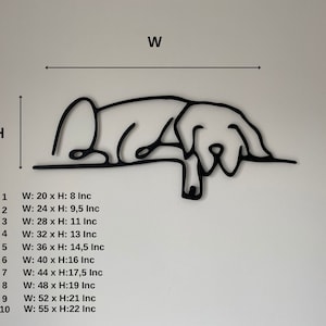May include: A black line drawing of a dog lying down. The image includes measurements for different sizes of the drawing, ranging from 51 cm wide by 20 cm high to 140 cm wide by 56 cm high.