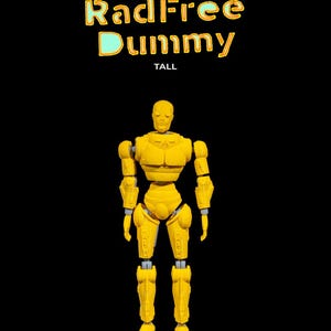 May include: A yellow articulated plastic action figure of a human standing on a black surface. The figure is labeled "RadFree Dummy TALL".