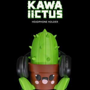 May include: A green cactus-shaped headphone holder with a brown pot and a cute face. The text "KAWA IICTUS HEADPHONE HOLDER" is above the cactus.