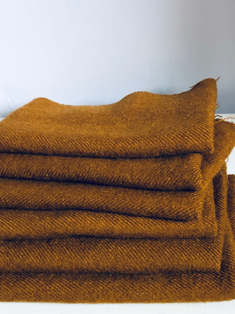 14 yard Caramel 100 percent wool for Rug Hooking Listing is for 1 piece I have 6 pieces if you need more.
