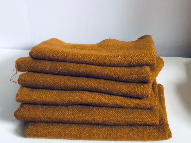 14 yard Caramel 100 percent wool for Rug Hooking Listing is for 1 piece I have 6 pieces if you need more.