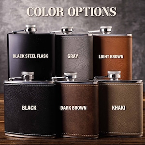 May include: Six different colour options for a hip flask. The flasks are made of metal and have a leather-like finish. The colours are black steel, grey, light brown, black, dark brown, and khaki.