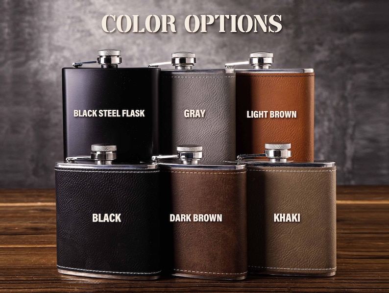 May include: Six different colour options for a hip flask. The flasks are made of metal and have a leather-like finish. The colours are black steel, grey, light brown, black, dark brown, and khaki.