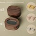 May include: Two oval wooden boxes with lids, one with a mirror inside. The boxes are labeled "Box 1" and "Box 2". Three pairs of cufflinks are shown in separate boxes: gold, rose gold, and silver.