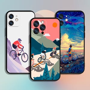 May include: Three phone cases with cycling designs. One shows a cyclist on a mountain, another depicts cyclists on a road with a sunset, and the third features a cyclist on a path with a colourful sky.