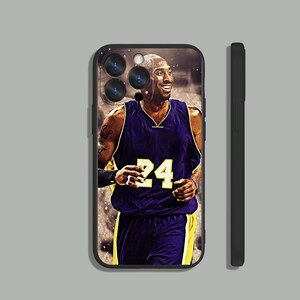 May include: Black phone case with a photo of Kobe Bryant wearing a purple and gold basketball jersey with the number 24 on the front.