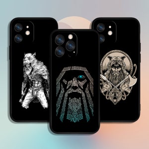 May include: Three black phone cases with different designs. The first case features a white wolf with a beard. The second case features a blue and green Viking head with a beard. The third case features a brown wolf with a beard and a bear head.
