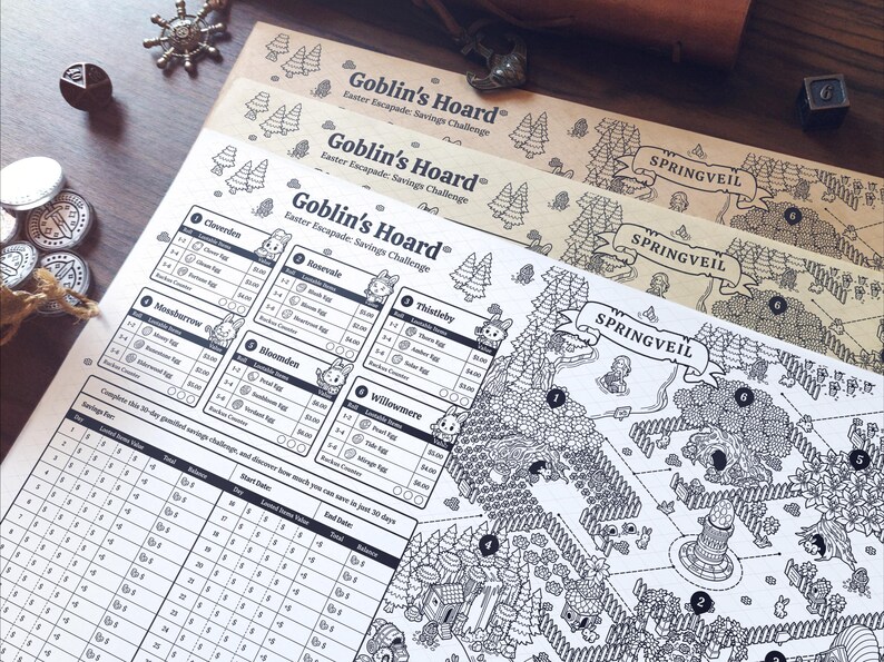 May include: A stack of three illustrated game boards with the text "Goblin's Hoard Easter Escapade: Savings Challenge" and "Springveil". The boards feature a black and white map design with various locations and character illustrations. Additional game pieces are visible.