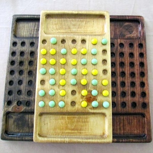 Solid Wood 4 Thought Game with marbles