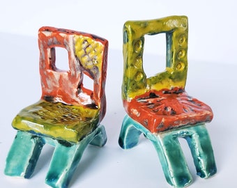 Pair of ceramic chairs