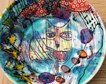ceramic bowl with cat motif