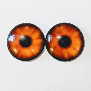 One pair of glass eyes orange and brown choose size