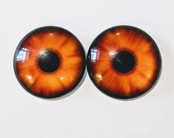 One pair of glass eyes orange and brown choose size