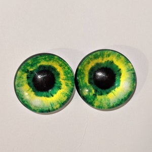 One pair of glass eyes green and black choose from various sizes