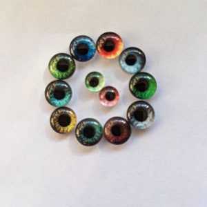 One pair of glass eyes 6mm - 12mm various colours
