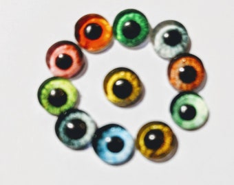 One pair of glass cabachon eyes with metal post 6mm various colours