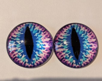 One pair of blue/pink cabachon glass eyes dinosaur / animal eyes