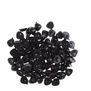 May include: A large pile of black plastic doll eyes. The eyes are all different sizes and shapes, but they are all black.