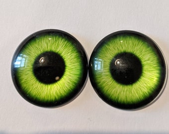 One pair of glass cabachon eyes with metal posts green or blue colour various colours and sizes