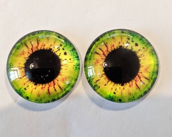 One pair of glass cabachon eyes green/yellow colour 30mm