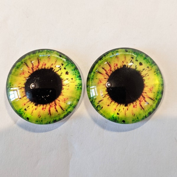 One pair of glass cabachon eyes green/yellow colour 30mm