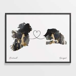 Op de afbeelding: Een abstracte kaart van Ierland in zwart en goud verbonden met een abstracte kaart van Senegal door een lijn met een hart in het midden. De tekst "Ierland" en "Senegal" staat onder de kaarten.