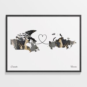 May include: A black and white world map with gold accents, showing Canada and Russia connected by a heart-shaped line. The text "Canada" and "Russia" are written below the respective countries.