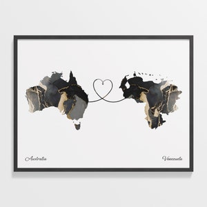 May include: A black and gold watercolor map of Australia and Venezuela connected by a heart-shaped line. The text "Australia" and "Venezuela" are written below the maps.