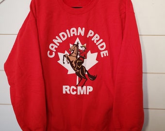 Vintage cherry red Canadian Pride RCMP graphic sweatshirt, women's size L XL
