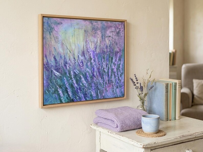 Dreamy abstract artwork of lavender flowers swaying in soft purples and blues, layered over a pastel sunrise backdrop.