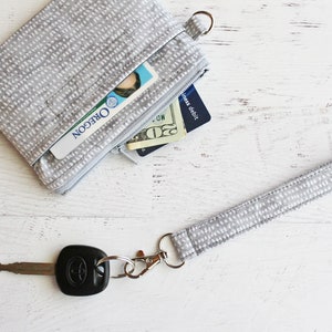 Cartera gris - pequeña pulsera - regalos para amigos - pequeño portadocumentos - llavero y estuche con cremallera - set de regalo