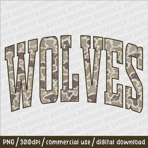 May include: The word "WOLVES" in a distressed, arched font. The letters are filled with a camouflage pattern in shades of brown, tan, and gray. The background is white with a watermark of the words "GRAPHICA ARTSY".