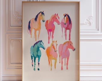 May include: A framed art print featuring six colourful horse illustrations. The horses are painted in shades of pink, orange, blue, and yellow, with a neutral background. The artwork is displayed in a gold frame.