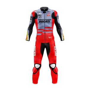 May include: A red, black, and gray racing suit with the words "GREMLIN RACING DUCATI" on the chest. The suit has a zipper down the front and is designed for motorcycle racing.