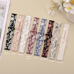 May include: Eight different colored watch bands with a floral pattern. The bands are in the colors black, nude, white, smoke violet, blue, black/pink, beige, and starlight.