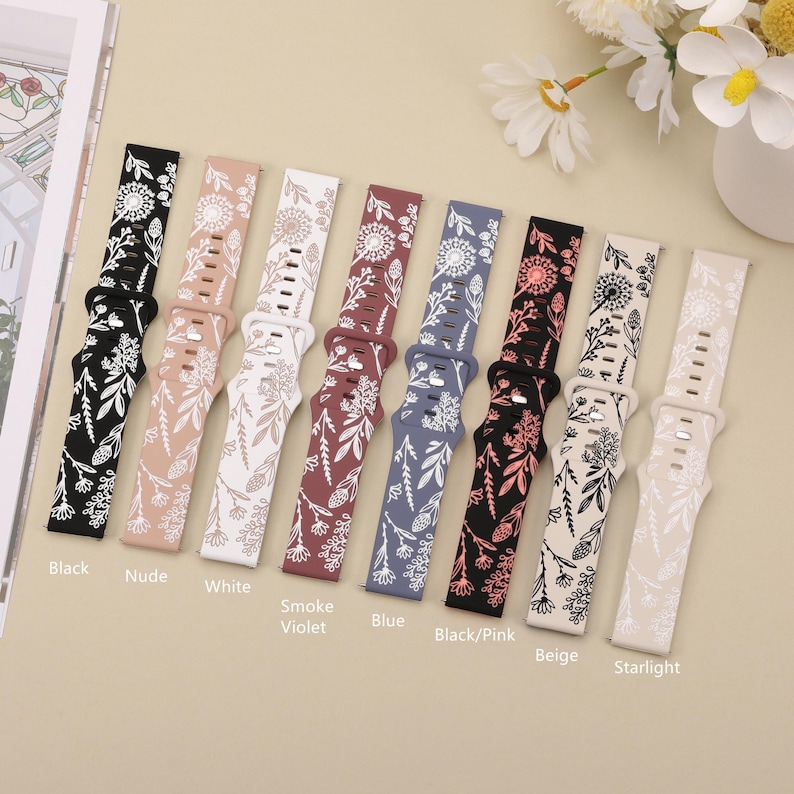 May include: Eight different colored watch bands with a floral pattern. The bands are in the colors black, nude, white, smoke violet, blue, black/pink, beige, and starlight.