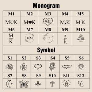 Puede incluir: Un gr&aacute;fico con dos secciones, "Monograma" y "S&iacute;mbolo". Cada secci&oacute;n tiene 12 cuadrados con diferentes dise&ntilde;os. La secci&oacute;n "Monograma" tiene iniciales y la secci&oacute;n "S&iacute;mbolo" tiene varios s&iacute;mbolos como corazones, flores y mariposas.