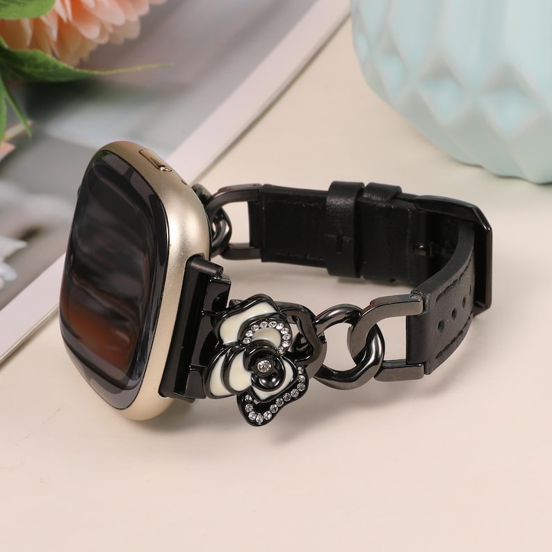 Stylish women’s Fitbit band with stainless steel chain links