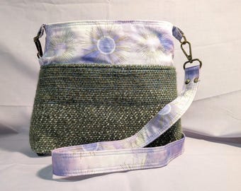 Crossbody bag featuring hand dyed and handwoven fabric in green and purple