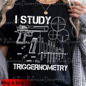 May include: Black t-shirt with a white graphic design featuring a handgun, bullets, and crosshairs. The text "I STUDY TRIGGERNOMETRY" is displayed above and below the graphic. The design includes various bullet sizes and a magazine.