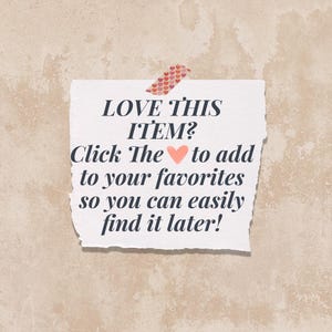 May include: A torn piece of paper with the text "LOVE THIS ITEM? Click The to add to your favorites so you can easily find it later!" is taped to a textured beige background with a decorative tape.