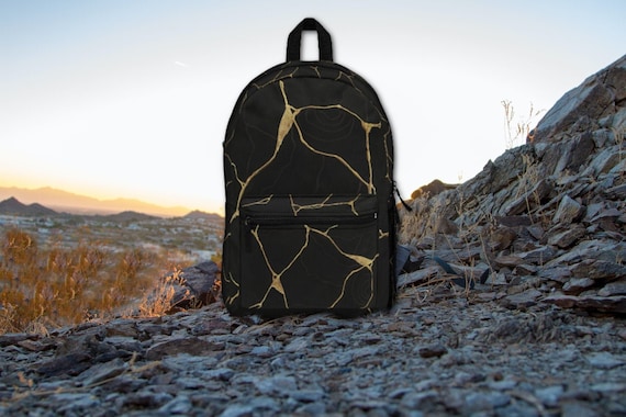 Black and gold sales school backpack