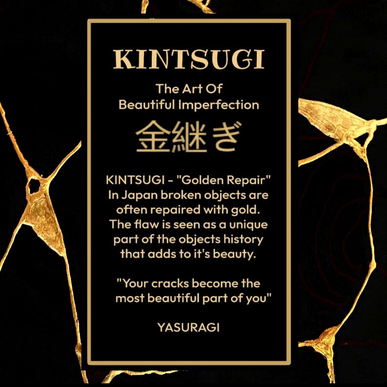 May include: A black rectangular sign with gold text reading KINTSUGI The Art Of Beautiful Imperfection, Japanese characters, and a description of the golden repair process. The background features gold lines resembling cracks on a black surface.