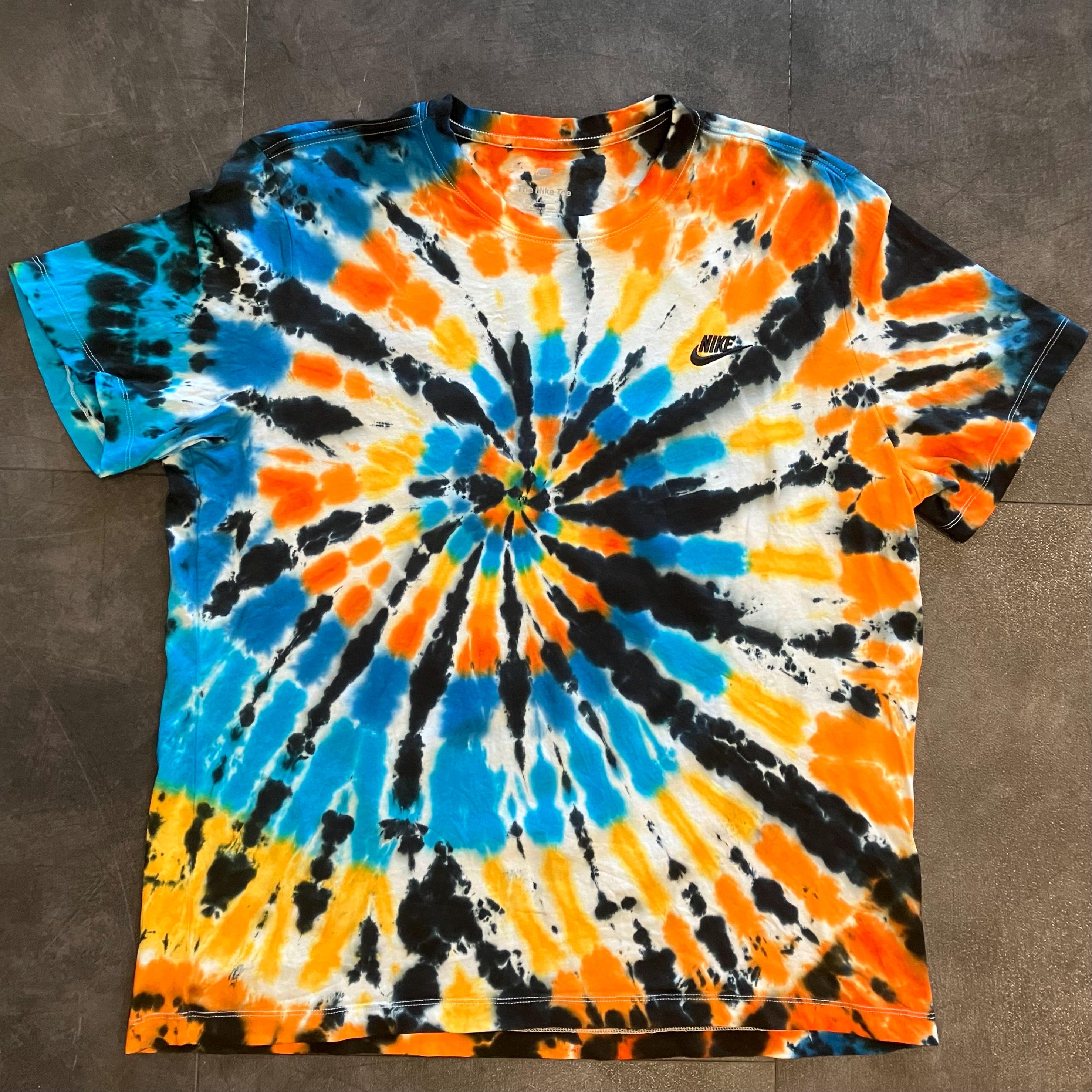 teal and orange nike shirt