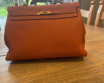 classique hermes kelly 35 des années 90 en bon état, orange et or