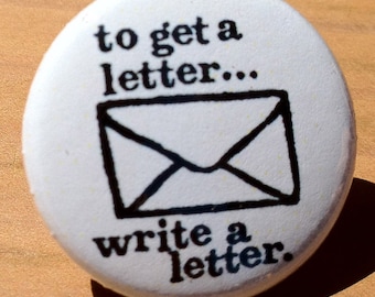 To get a letter write a letter - button, magnet, bottle opener